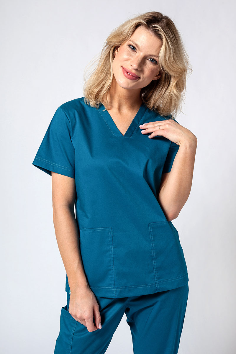 Dámska lekárska blúzka Sunrise Uniforms Active Bloom karaibsky modrá